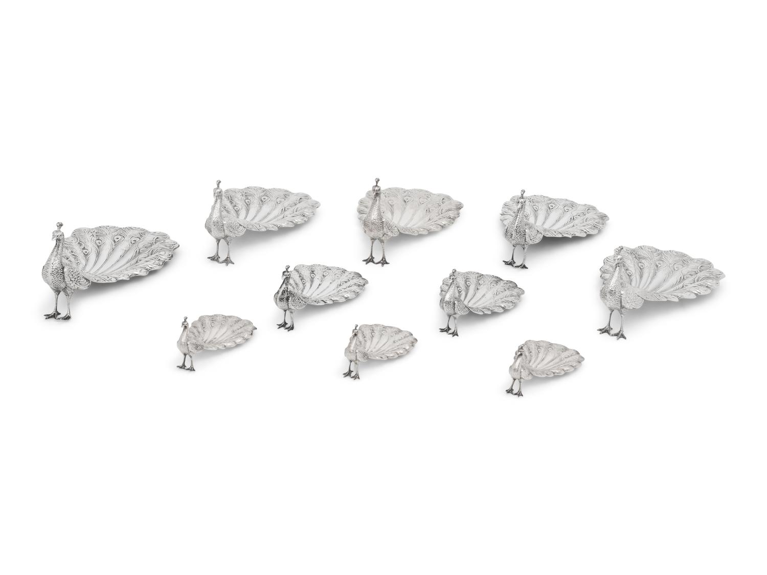 A Collection of Ten American Silver Peacock Table Ornaments