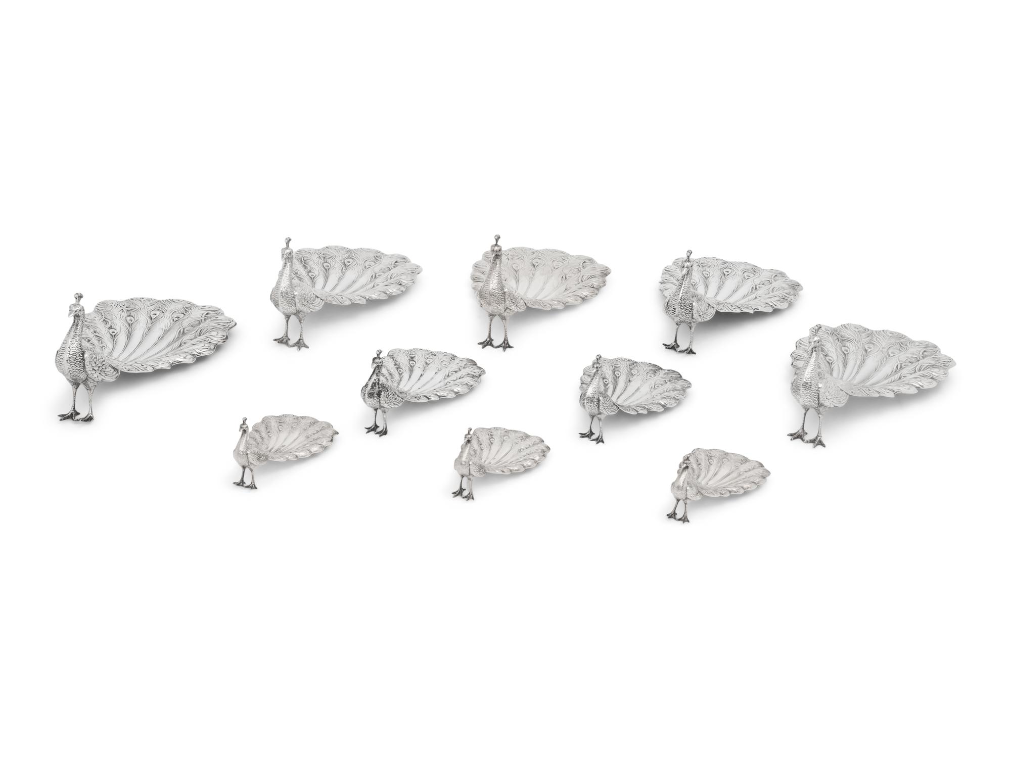 A Collection of Ten American Silver Peacock Table Ornaments