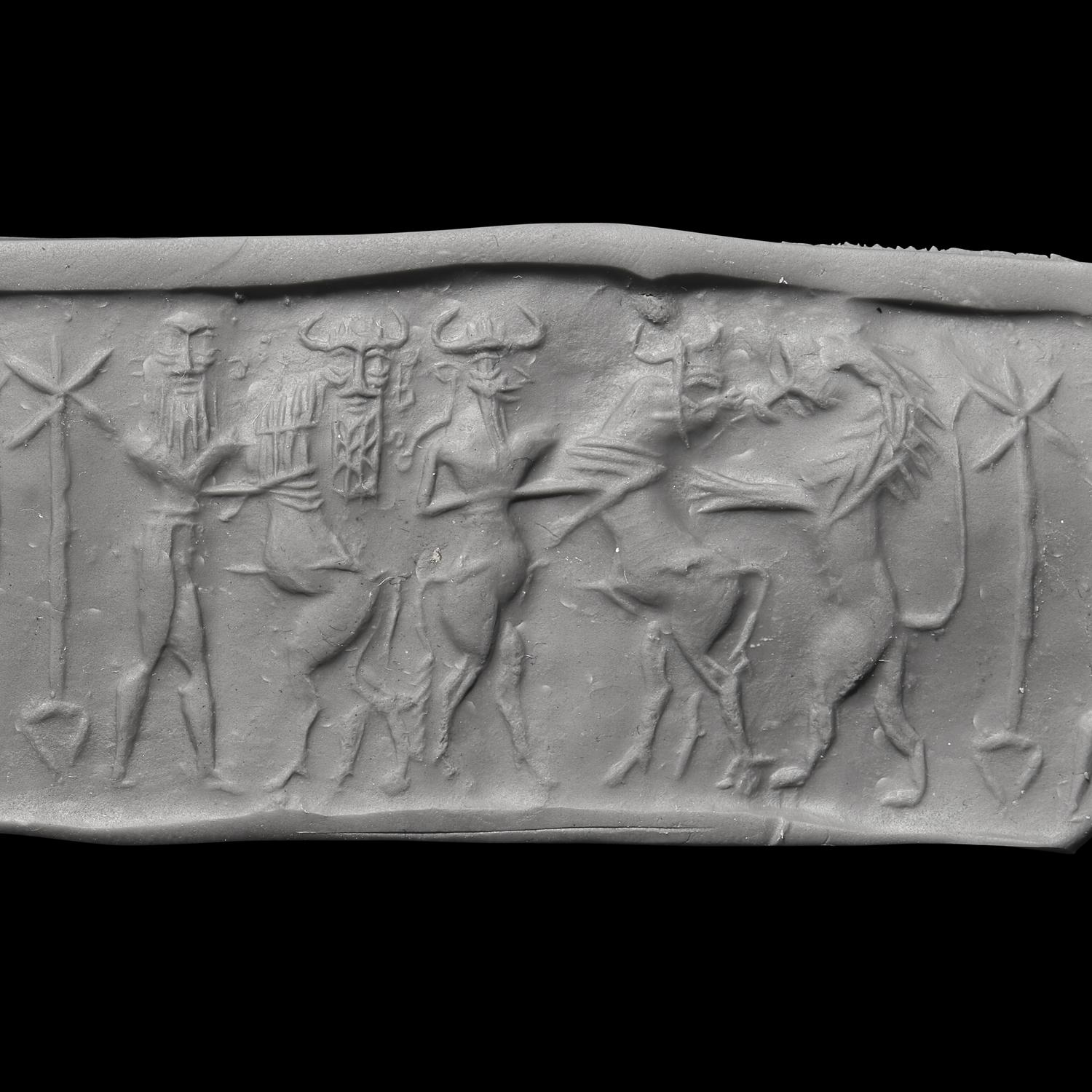 An Akkadian Hematite Cylinder Seal