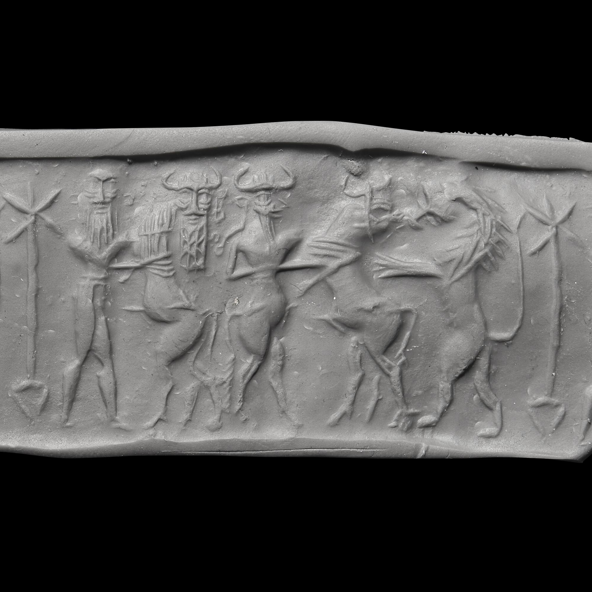 An Akkadian Hematite Cylinder Seal