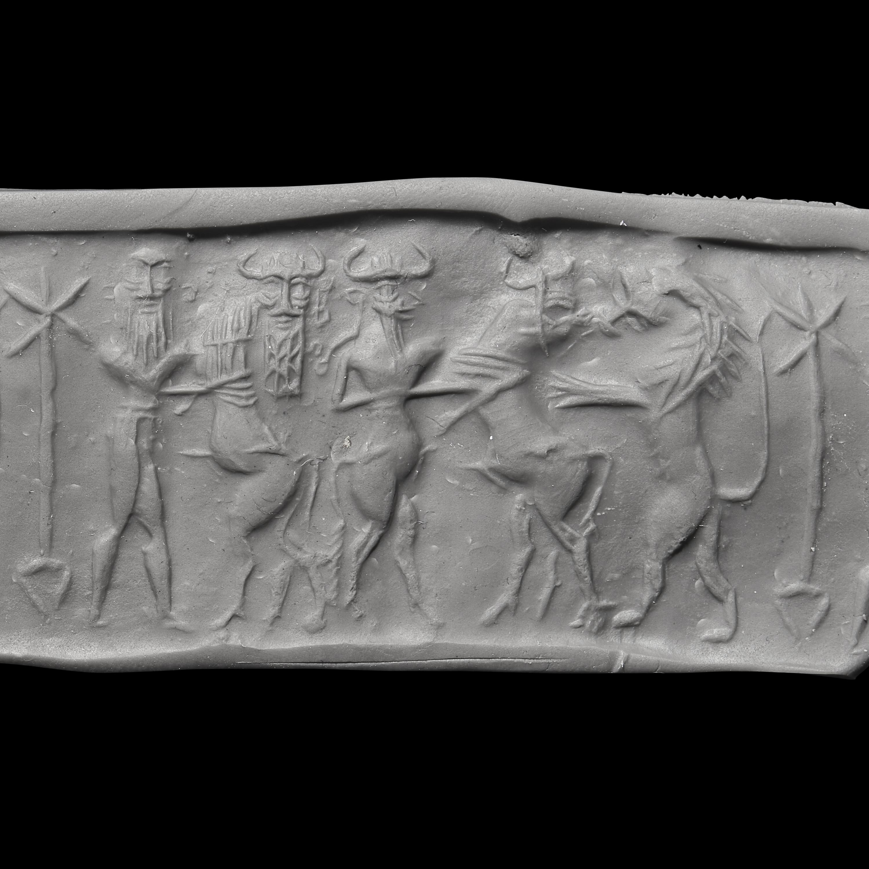 An Akkadian Hematite Cylinder Seal