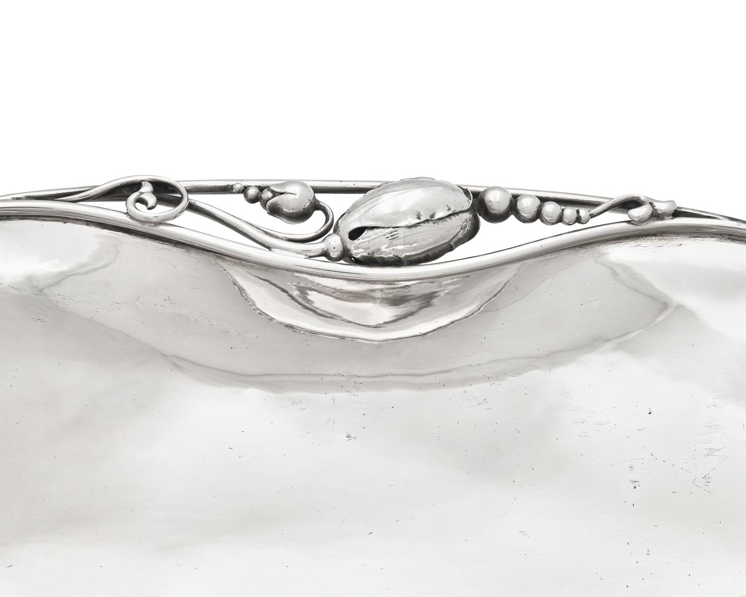 A Matched Pair of Georg Jensen Silver Blossom Pattern Dishes