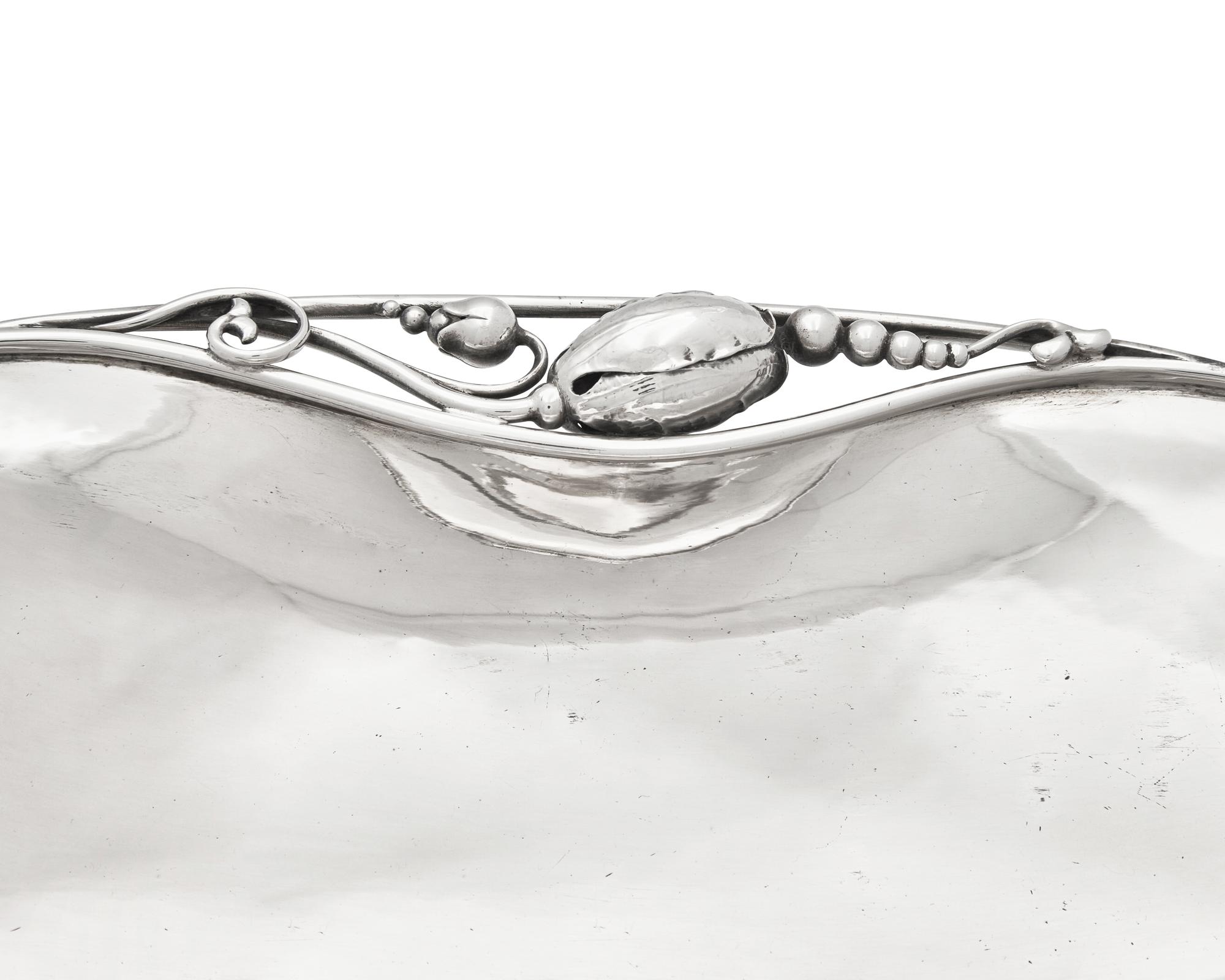 A Matched Pair of Georg Jensen Silver Blossom Pattern Dishes