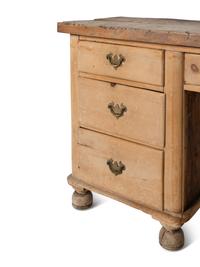 An English Pine Kneehole Dresser