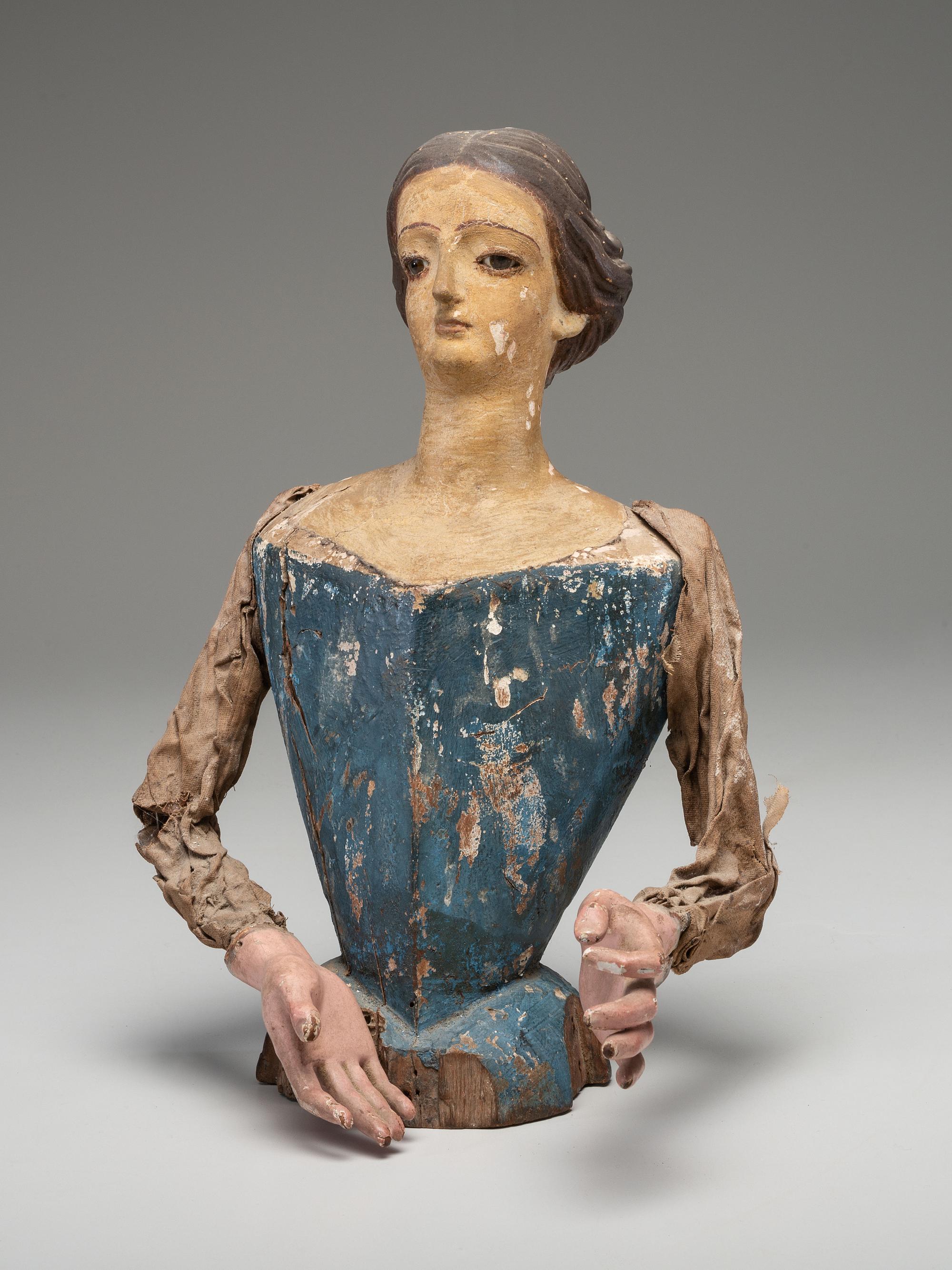 A Carved and Painted Wood Cage Skirt Doll Torso
