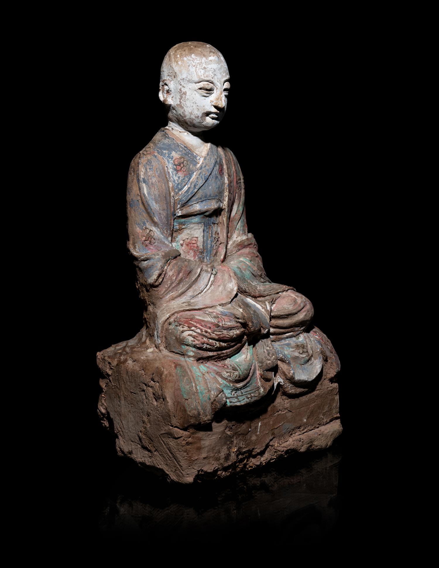 A Chinese Polychrome Painted Wood Figure of a Luohan