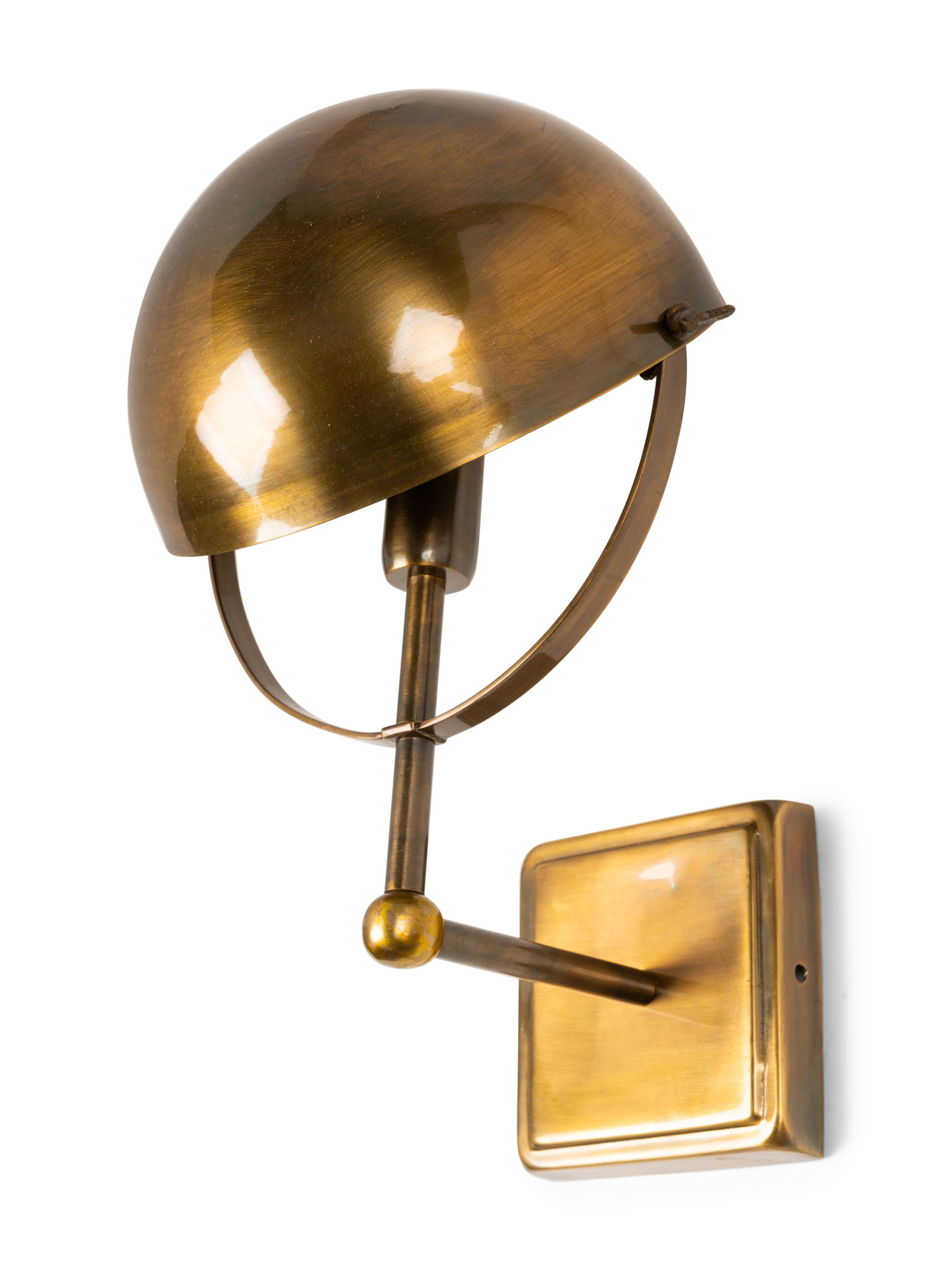 A Set of Four Brass Wall Lights