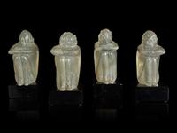 A Group of Four Glass Figural Groups