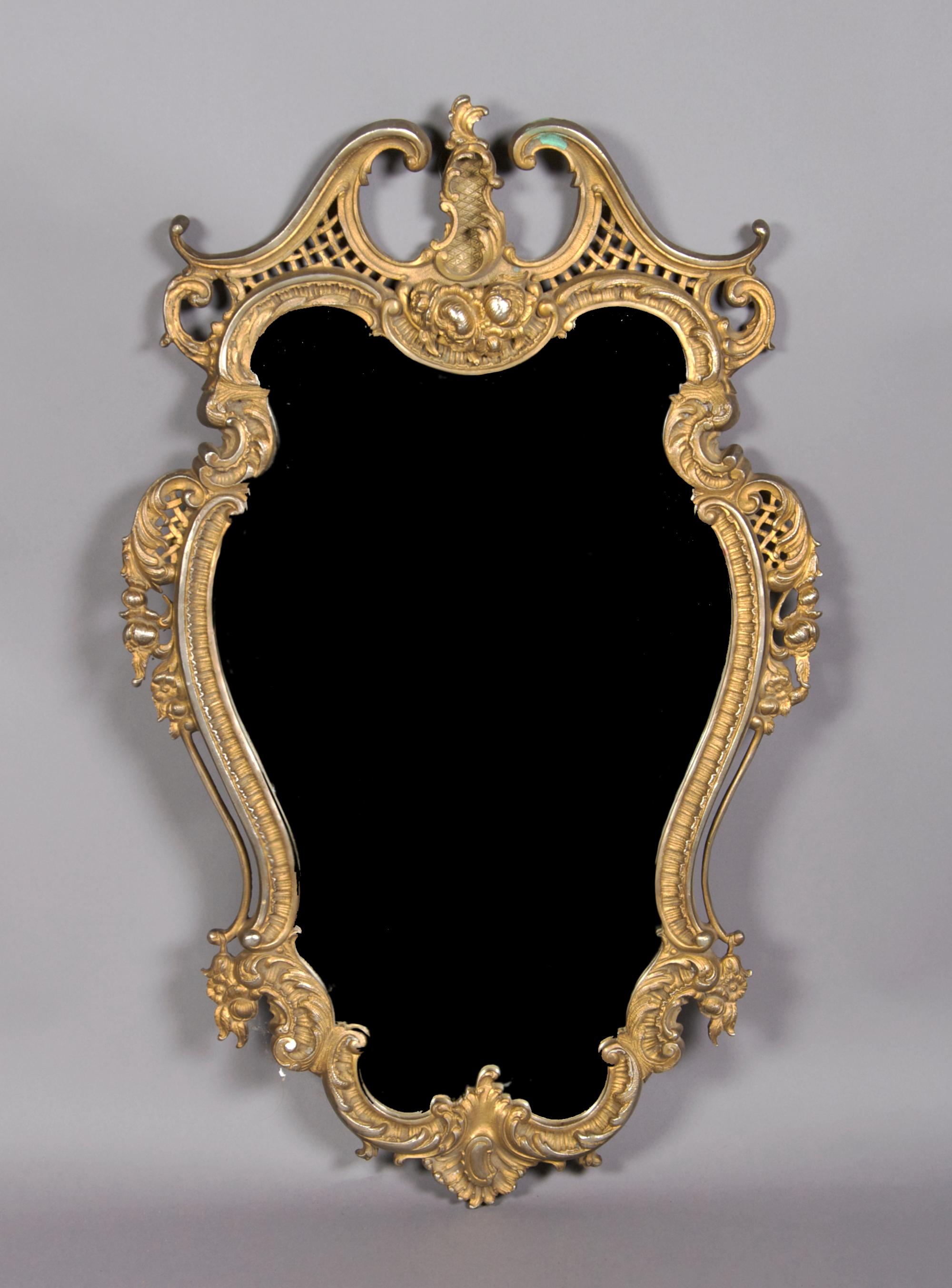 A Rococo Style Gilt Bronze Mirror, Height 35 inches.
