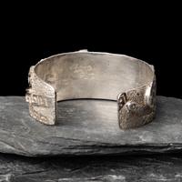 Andy Lee Kirk (Diné, 1947-2001) — Silver, Sugilite, and Opal Cuff Bracelet