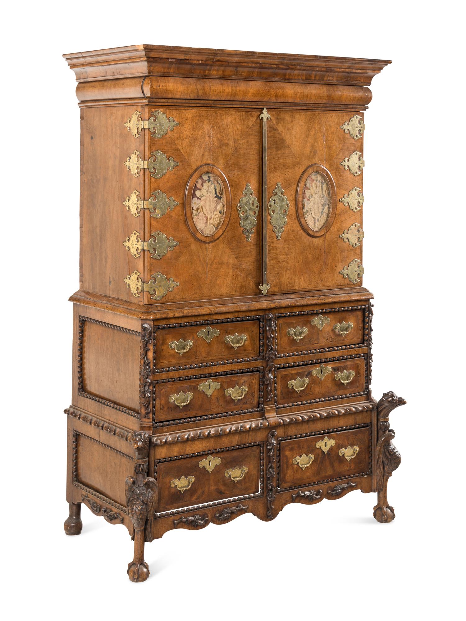 A Continental Baroque Brass Mounted Walnut Cabinet on Chest