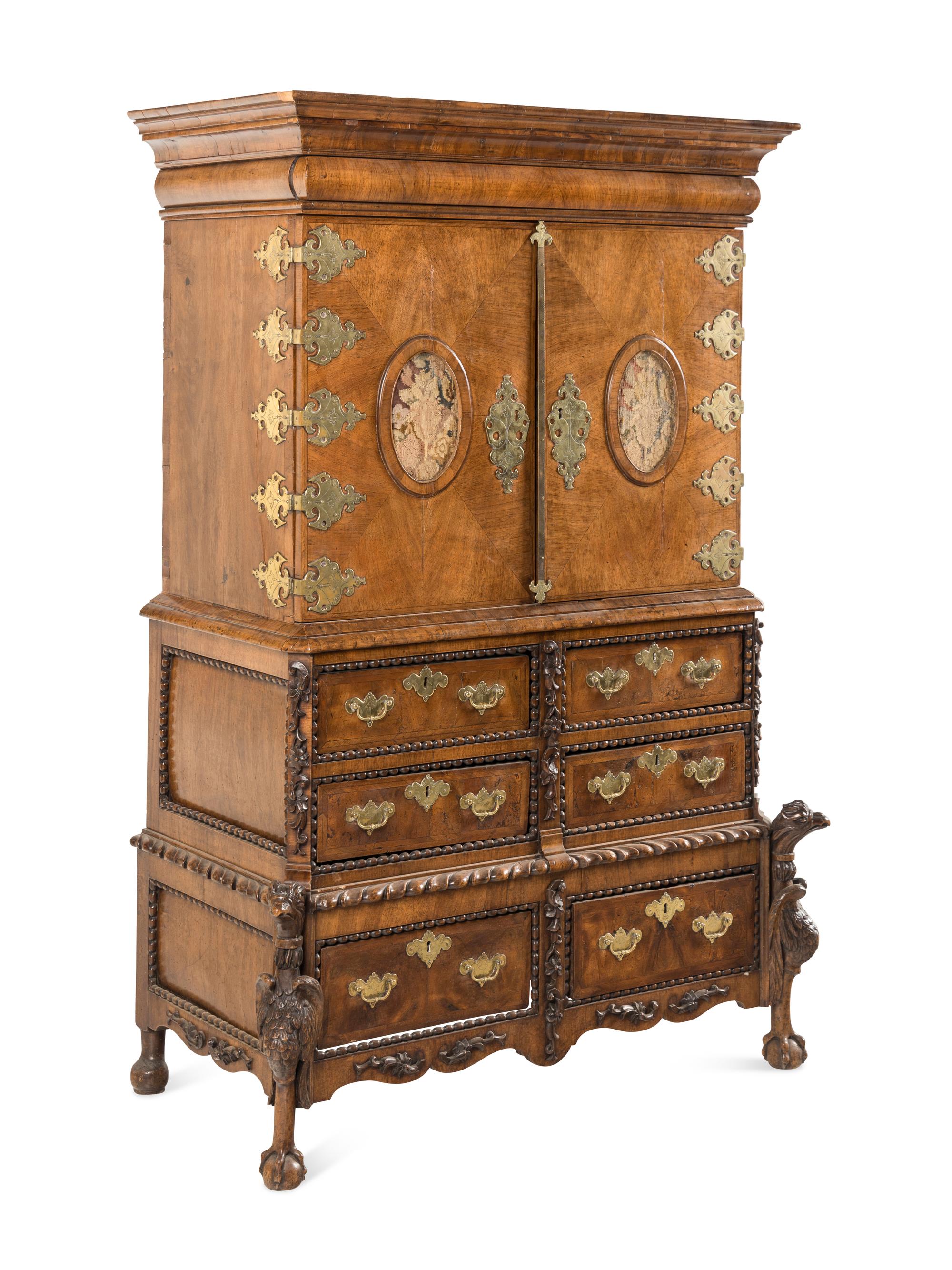 A Continental Baroque Brass Mounted Walnut Cabinet on Chest
