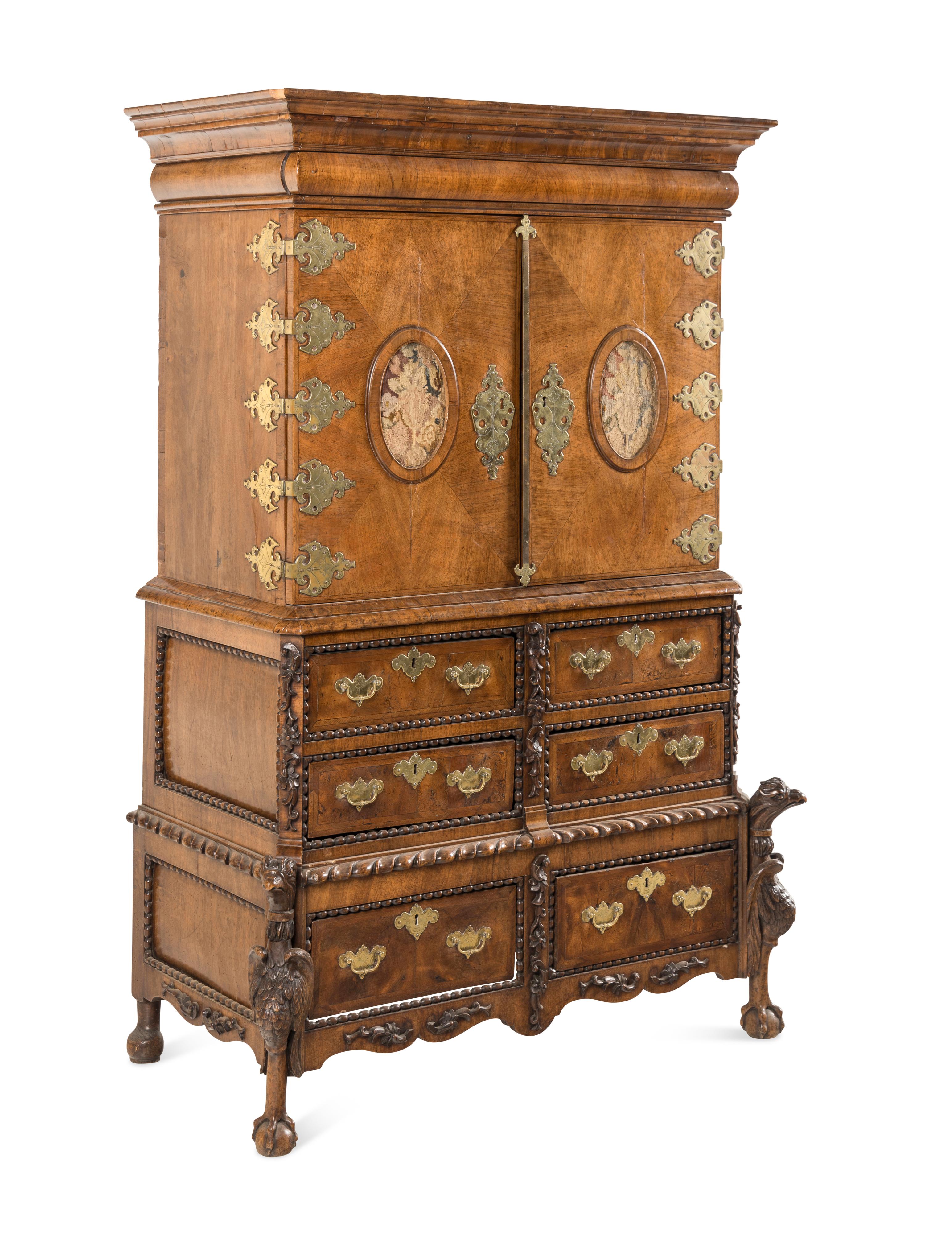 A Continental Baroque Brass Mounted Walnut Cabinet on Chest