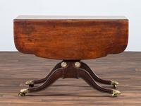 A Classical Brass-Mounted Walnut and Mahogany Pembroke Table