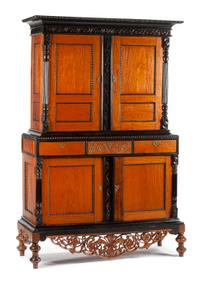 A Dutch Colonial Parcel Ebonized Satinwood Cabinet Height 81 x width 50 x depth 20 1/2 inches. — 19TH CENTURY