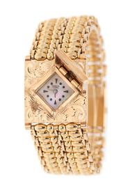 14K YELLOW GOLD SURPRISE WRISTWATCH