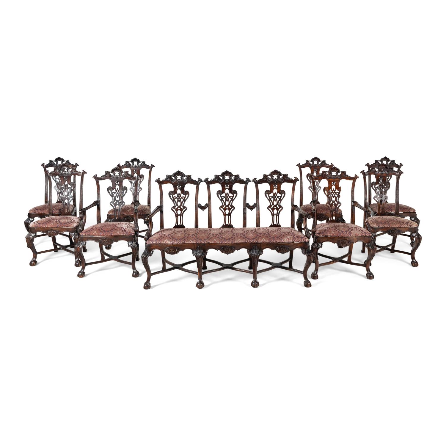 An Italian Rococo Style Carved Mahogany Nine-Piece Seating Suite