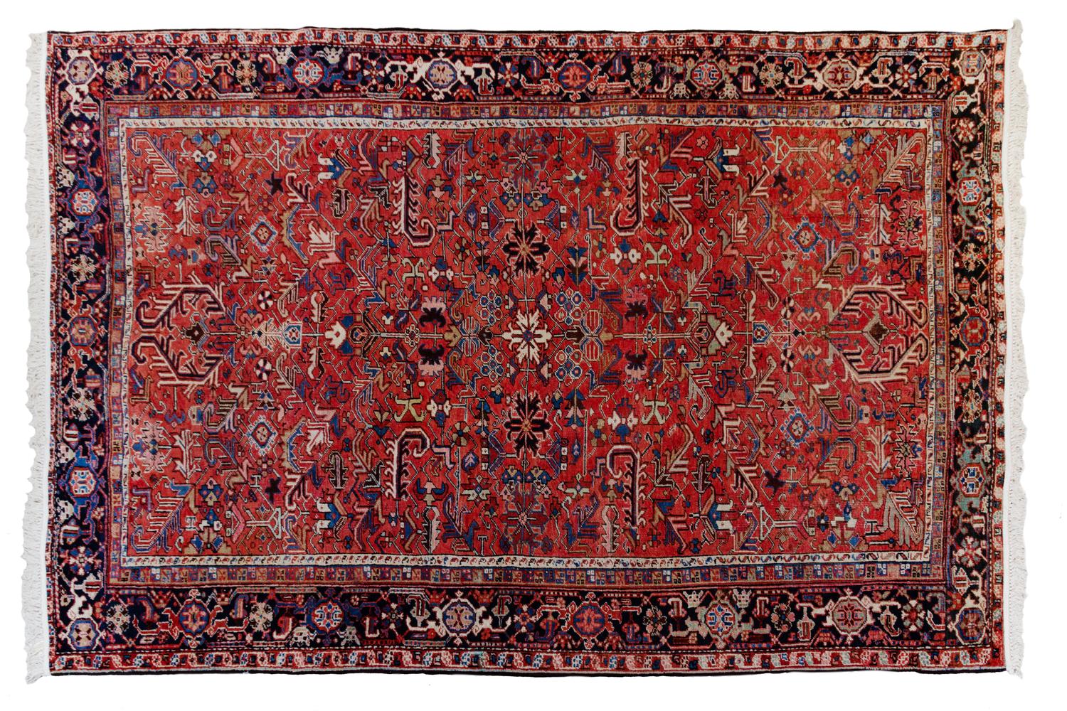 A Heriz Wool Rug 11 feet 2 inches x 8 feet 5 inches. — 20TH CENTURY