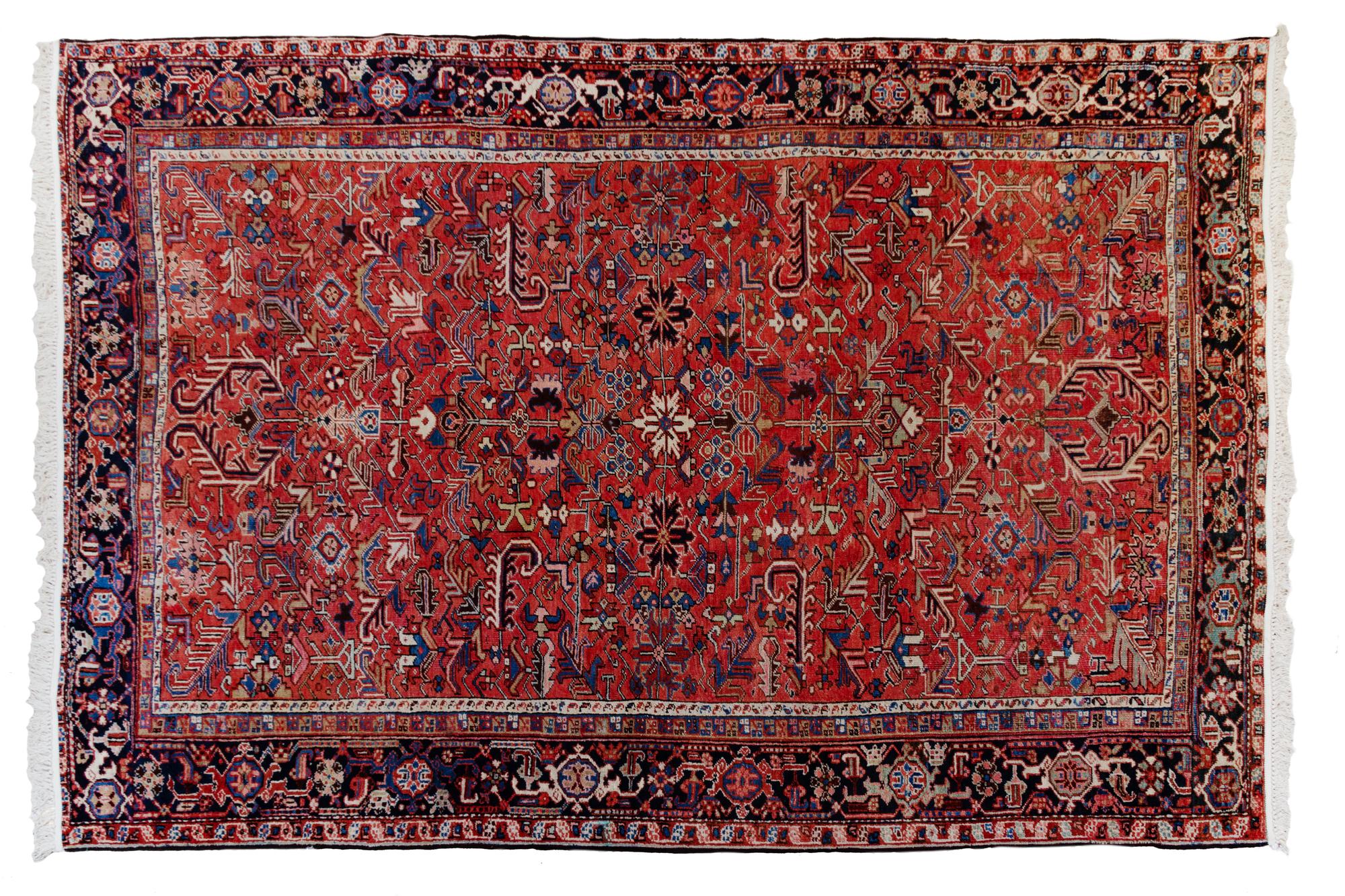 A Heriz Wool Rug 11 feet 2 inches x 8 feet 5 inches. — 20TH CENTURY