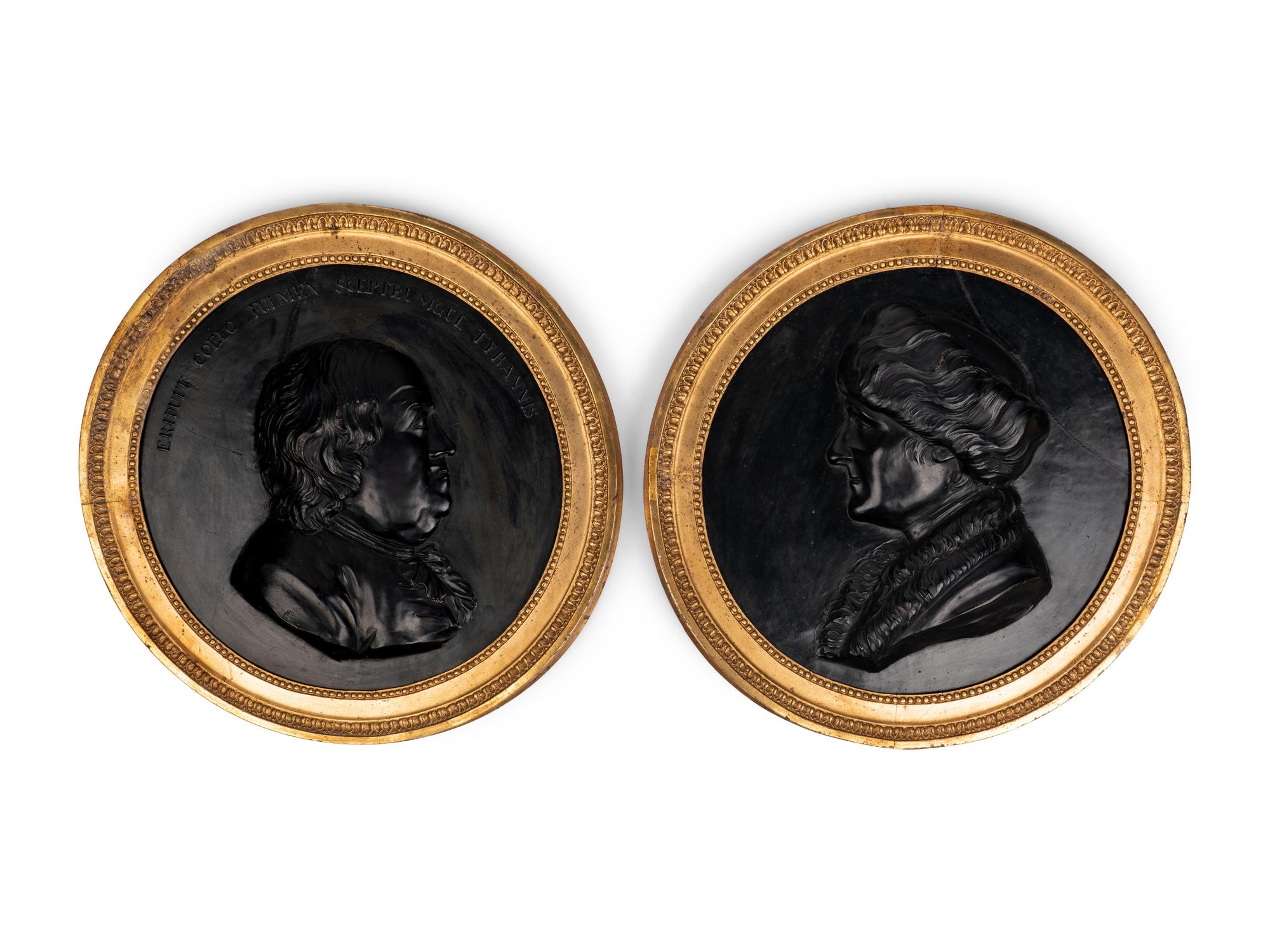 A Pair of Continental Cast Plaster Portrait Plaques of Benjamin Franklin and Thomas Jefferson