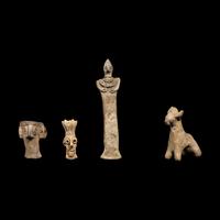 Eight Near Eastern Terracotta Figurines and Vessels