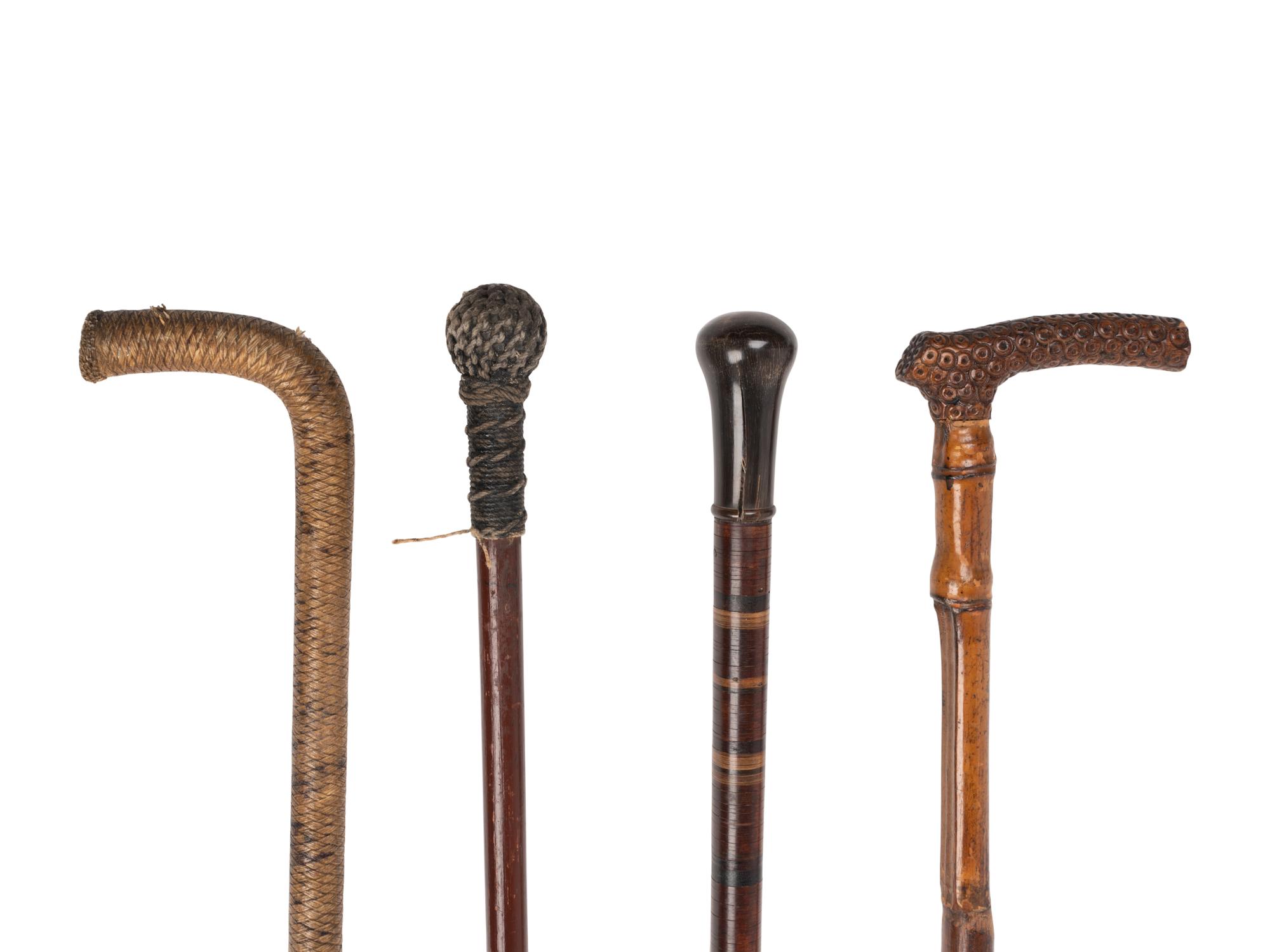 [COMBINED WITH ITEM 2] Four Carved Wood Walking Sticks