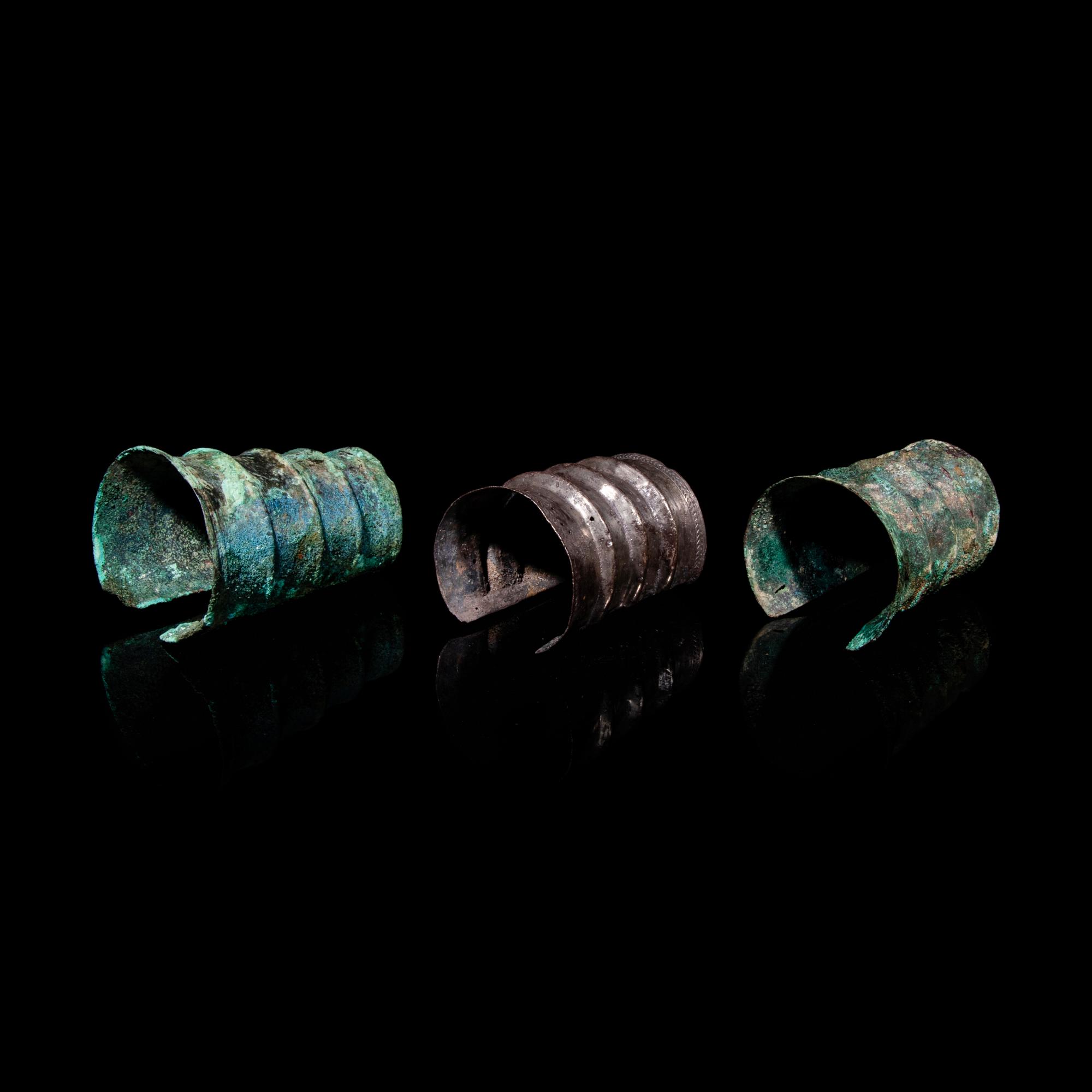 Three Chinese Silver and Bronze Wrist Guard Bracelets, Northeast China, Xianbei Tribe, Han Dynasty 汉 鮮卑银、青铜護臂三只