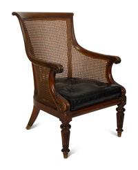 A Regency Style Caned Library Chair — 19TH/20TH CENTURY