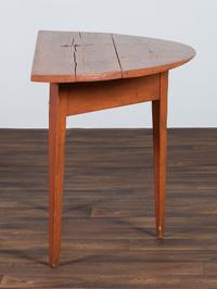 A Country Reddish Brown Painted Pine Demi-Lune Console Table