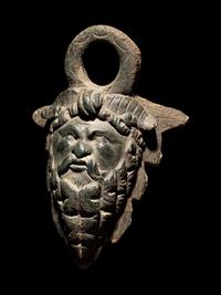 A Roman Bronze Satyr Applique