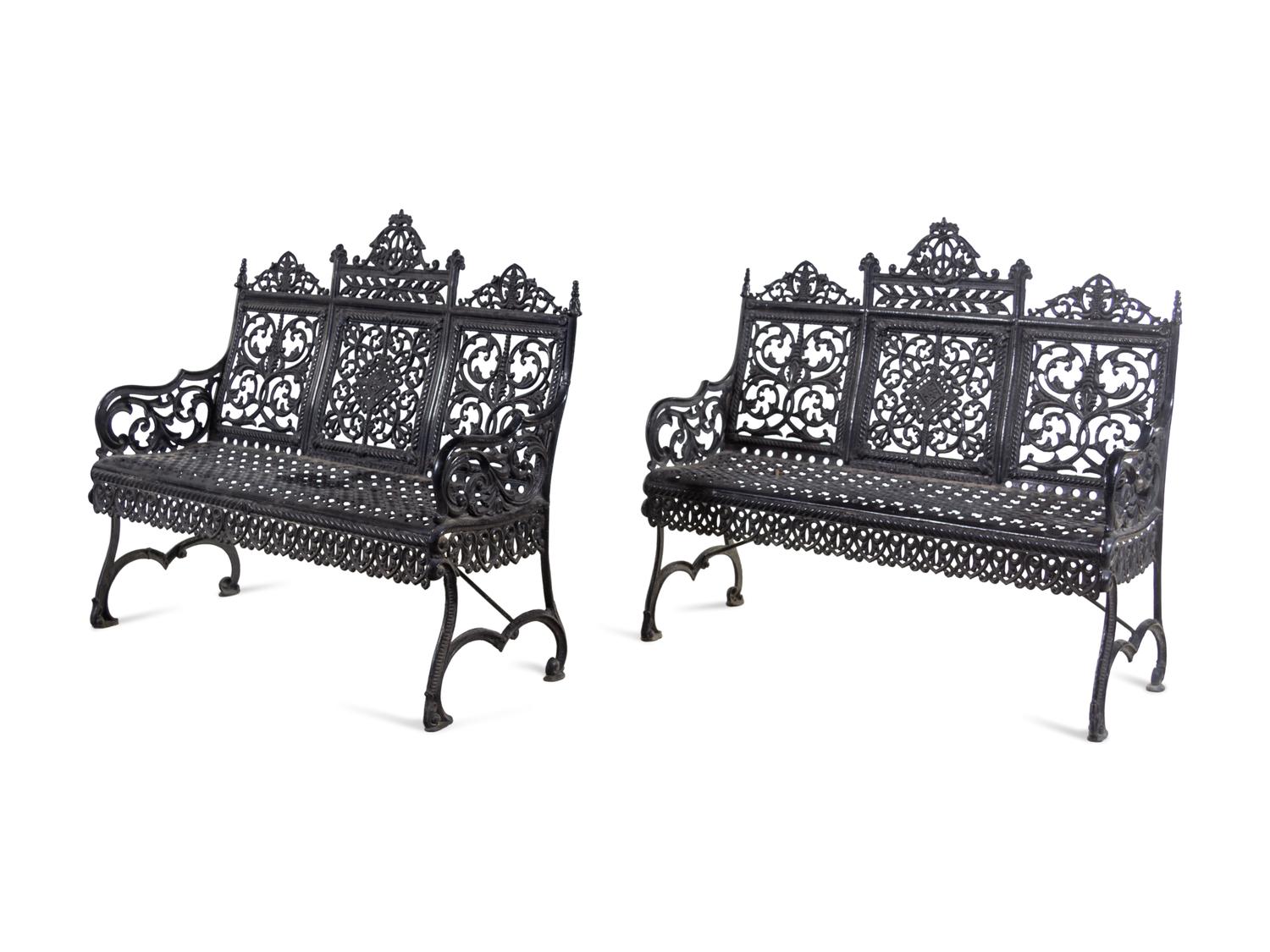 A Pair of American Gothic Revival Painted Cast Iron Garden Benches