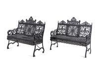 A Pair of American Gothic Revival Painted Cast Iron Garden Benches