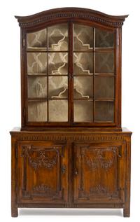 A French Provincial Walnut Bibliotheque Height 91 1/4 x width 54 x depth 17 1/4 inches. — CIRCA 1800