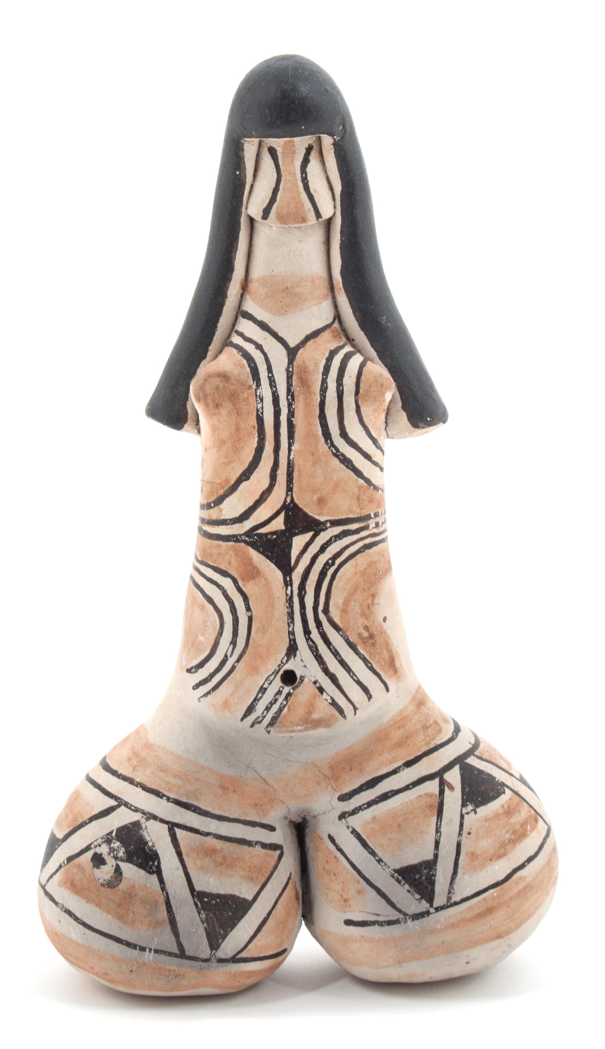 A Painted Ceramic Fertility Figure Height 9 3/4 inches.