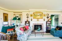 A Pair of Regency Style Grain-Painted and Gilt Metal-Mounted Diminutive Bookcases