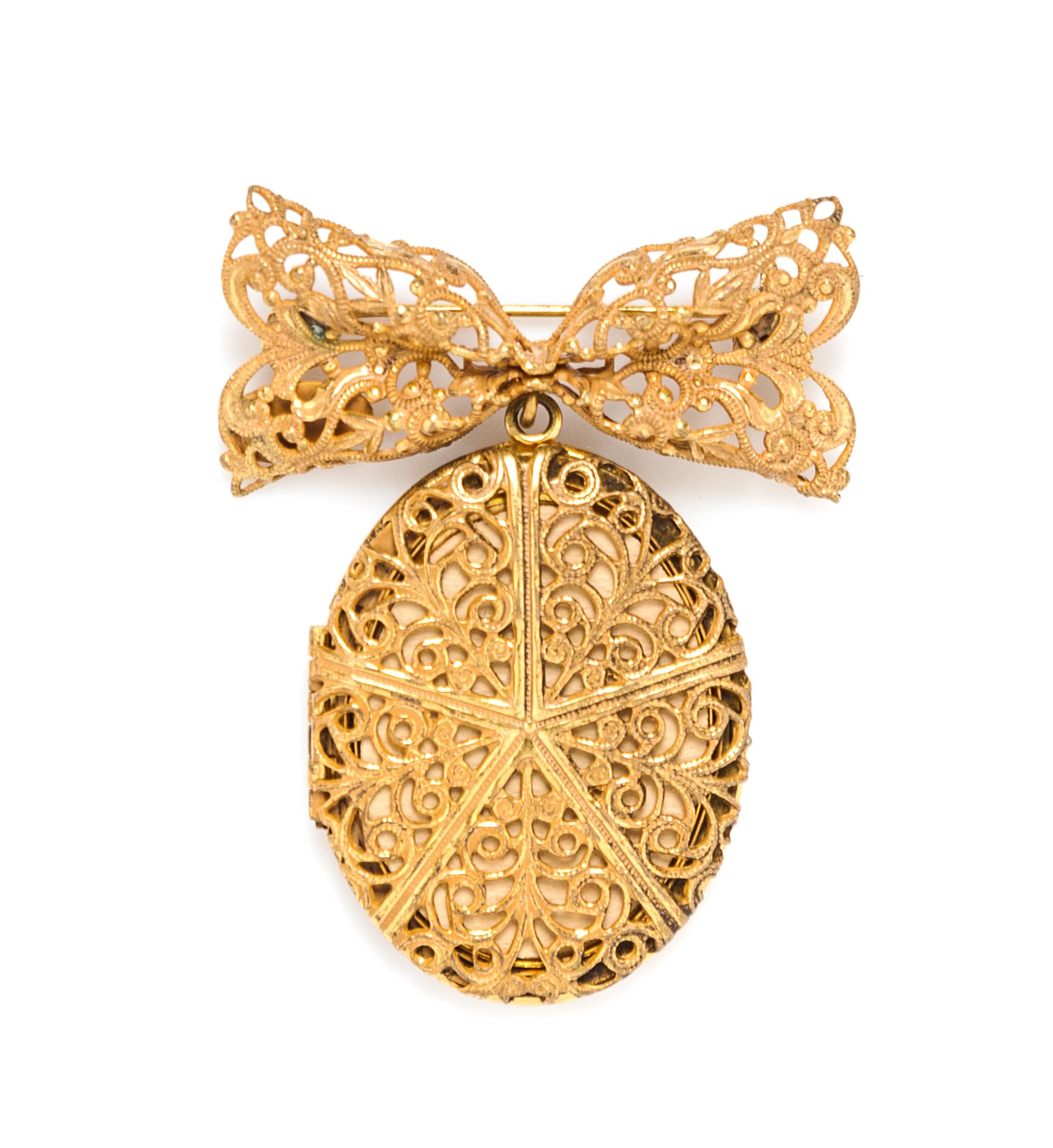 A Miriam Haskell Locket Brooch, 2.5" x 2".