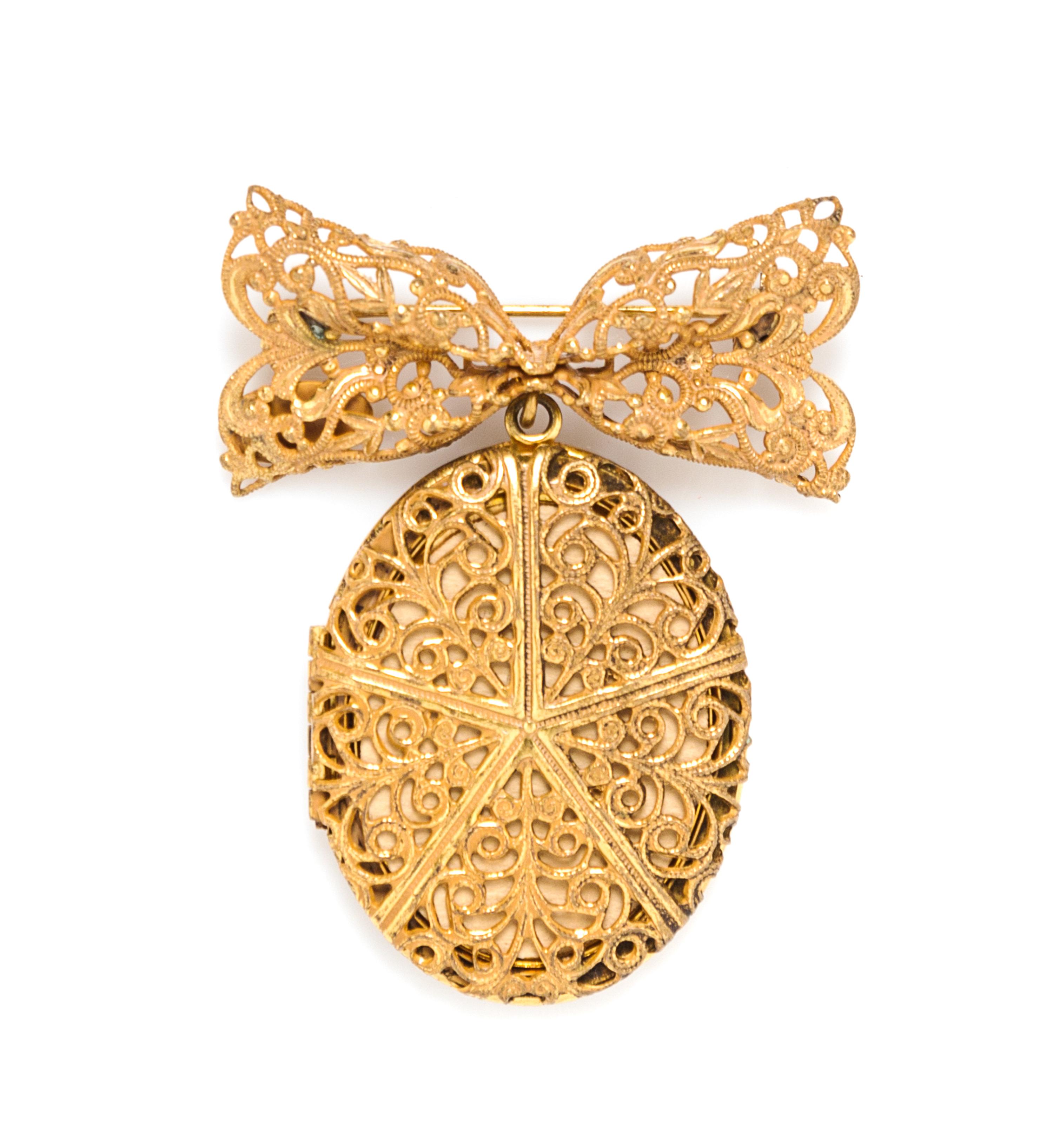 A Miriam Haskell Locket Brooch, 2.5" x 2".