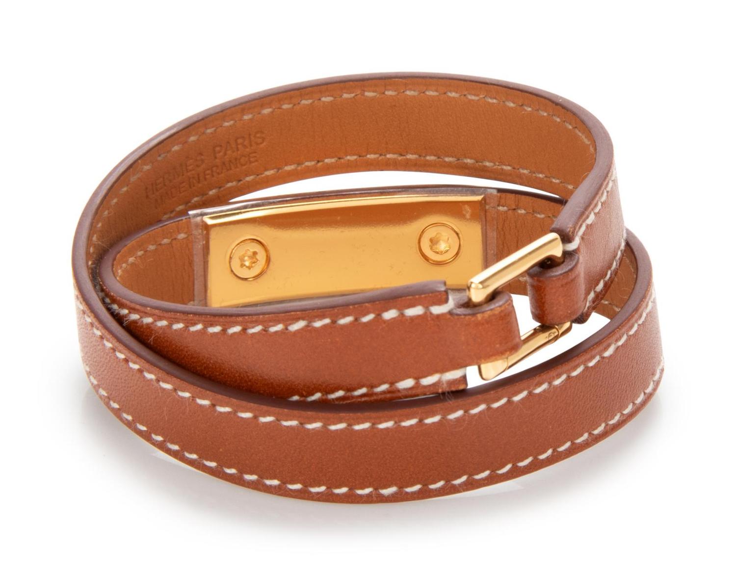 Three Hermès Leather Cuff Bracelets, 2011-2012