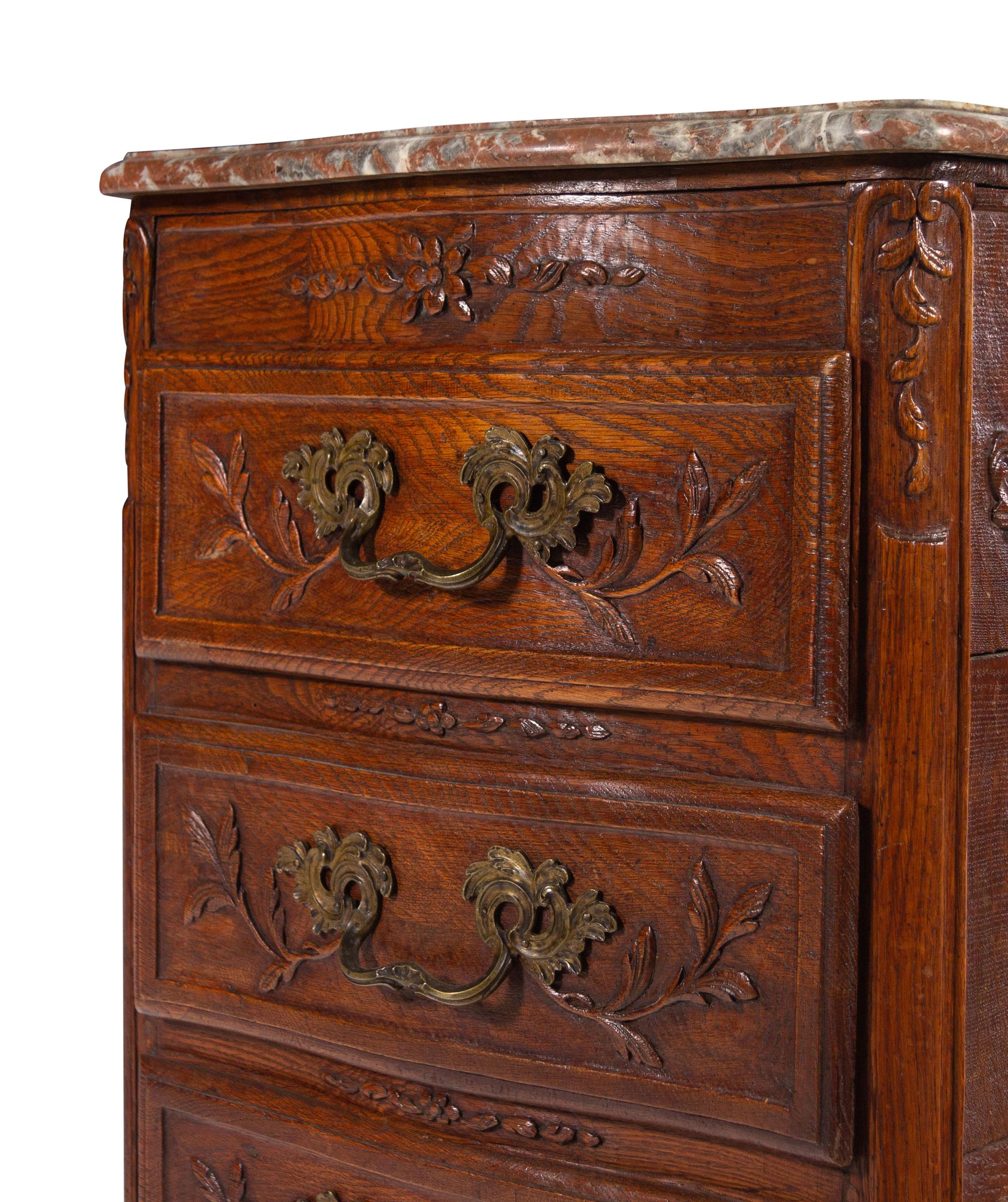 A Louis XV Style Chestnut Marble-Top Chest of Drawers