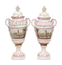 A Pair of Continental Porcelain Urns