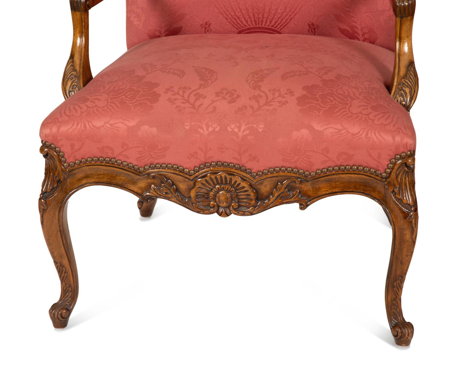A Pair of Regence Style Carved Beechwood Fauteuils