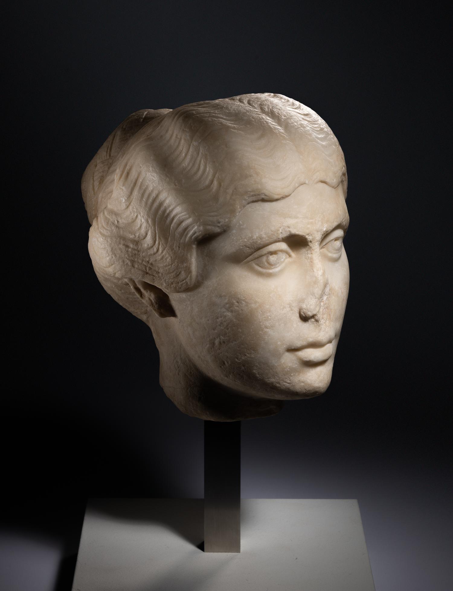 A Roman Marble Portrait Head of a Young Lady