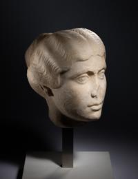 A Roman Marble Portrait Head of a Young Lady