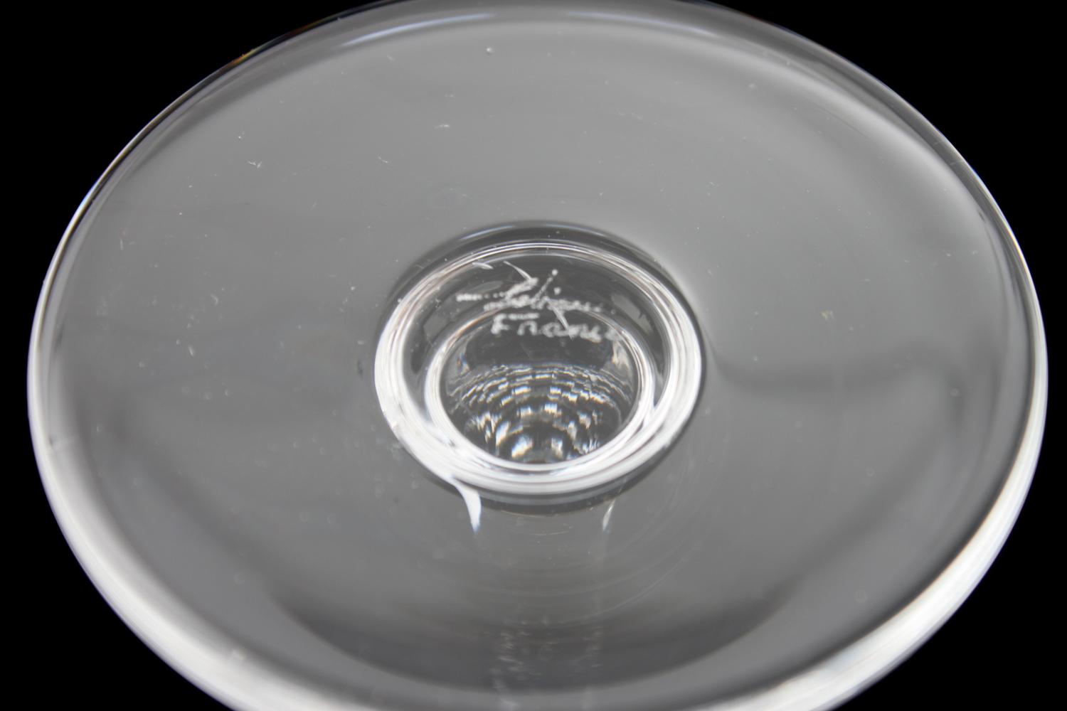 A Collection of Steuben Crystal Dinnerware Diameter of plates 8 3/4 inches