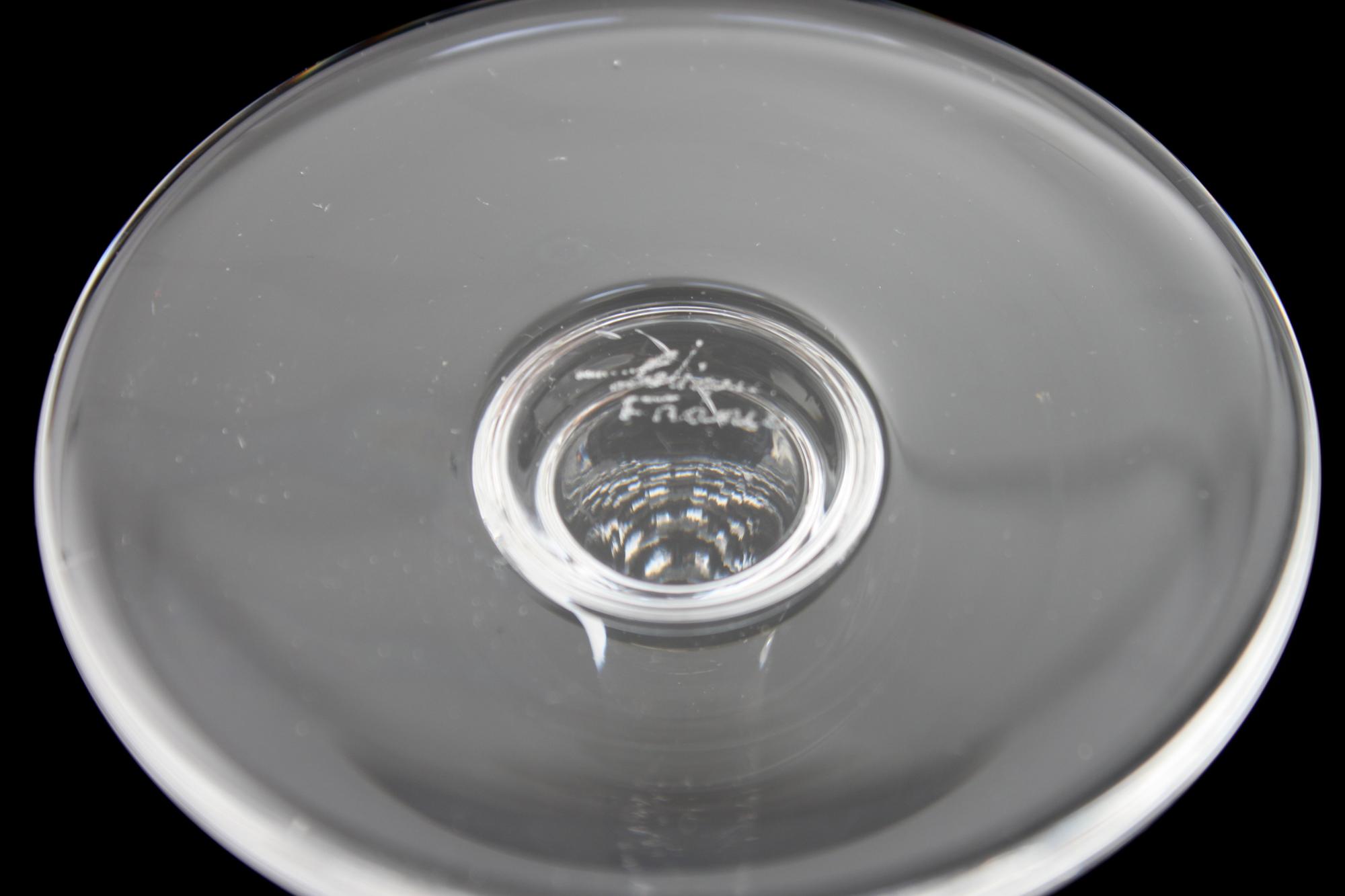 A Collection of Steuben Crystal Dinnerware Diameter of plates 8 3/4 inches