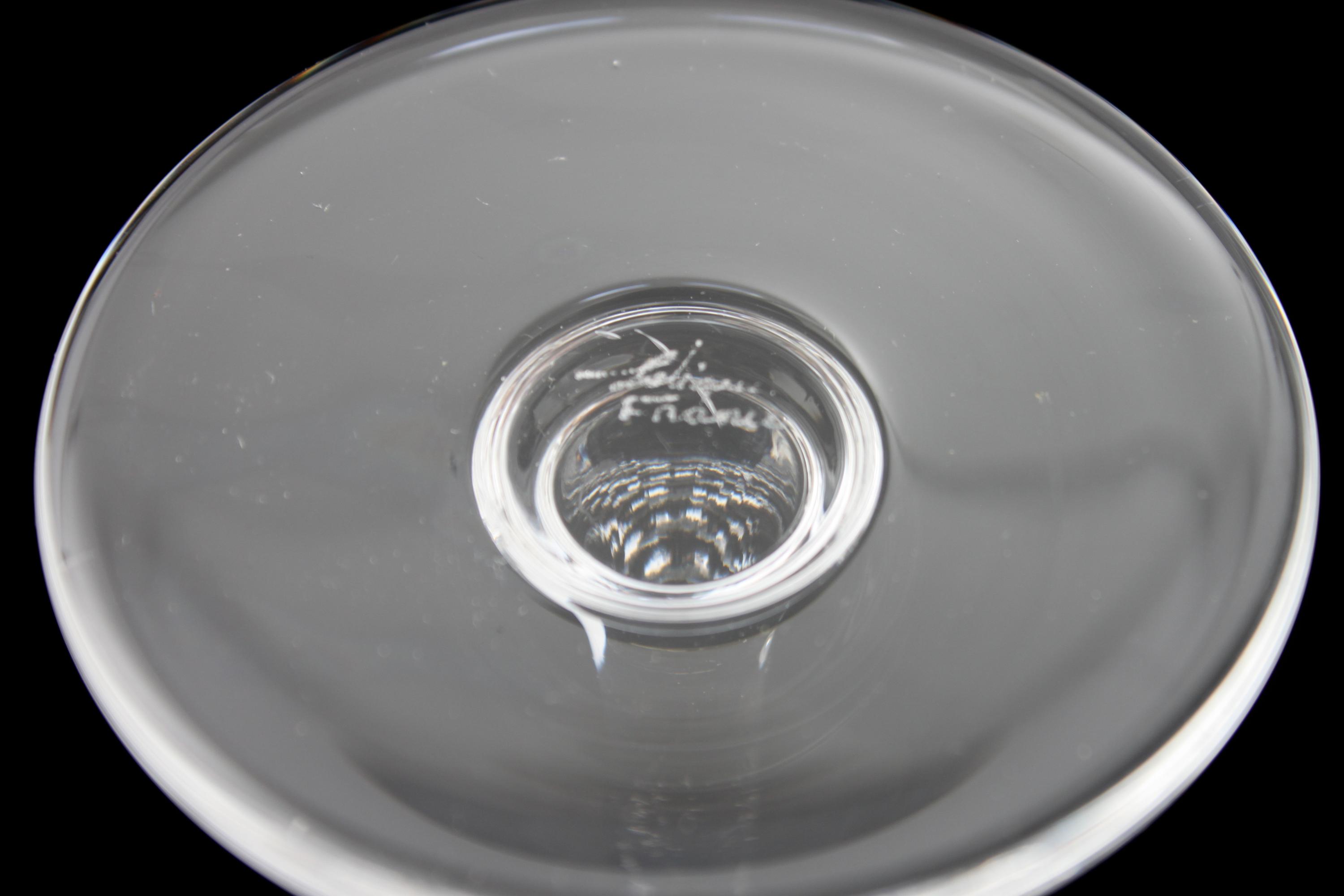 A Collection of Steuben Crystal Dinnerware Diameter of plates 8 3/4 inches