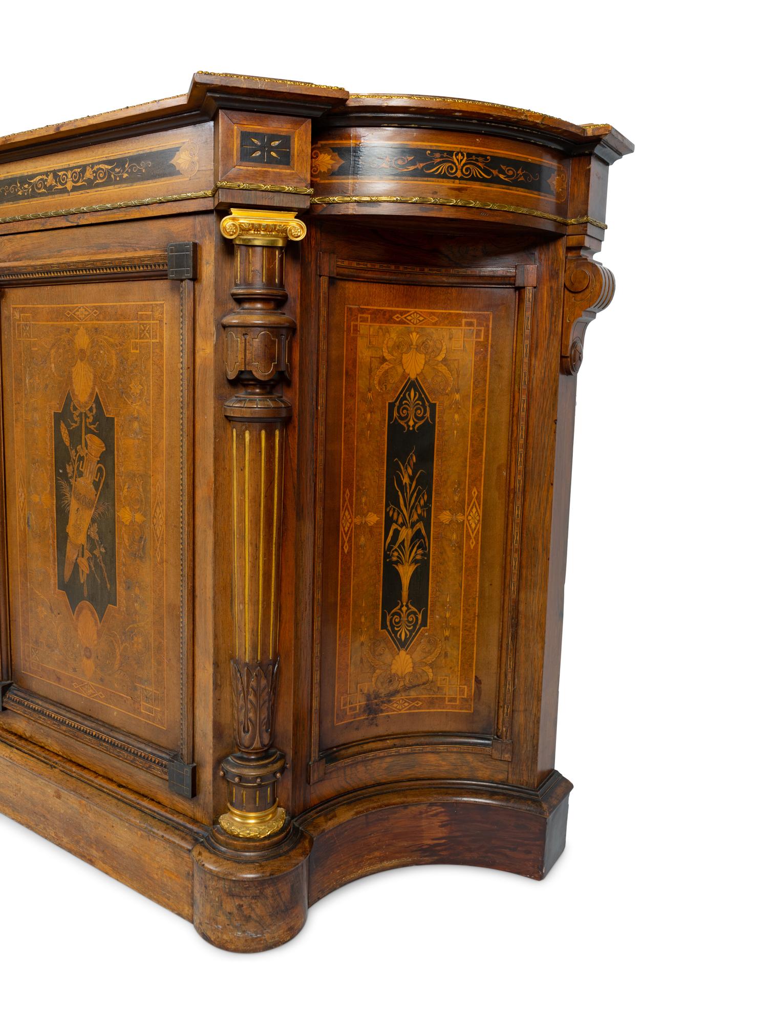 An English Aesthetic Movement Part-Ebonized Marquetry Cabinet