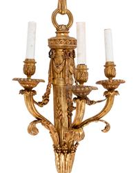 A Pair of Louis XVI Style Gilt Bronze Three-Light Sconces