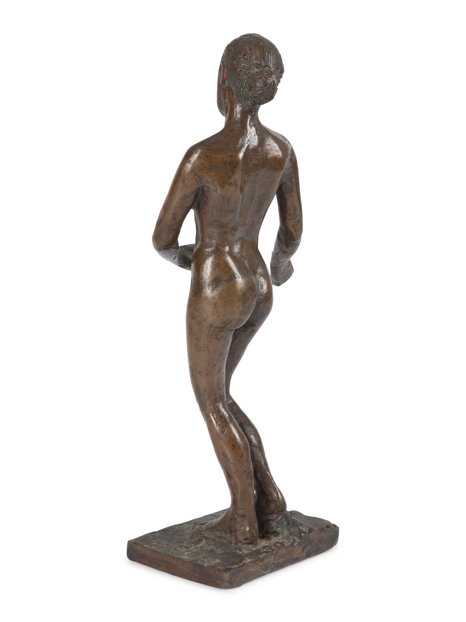 A Bronze Sculpture of a Nude Woman
