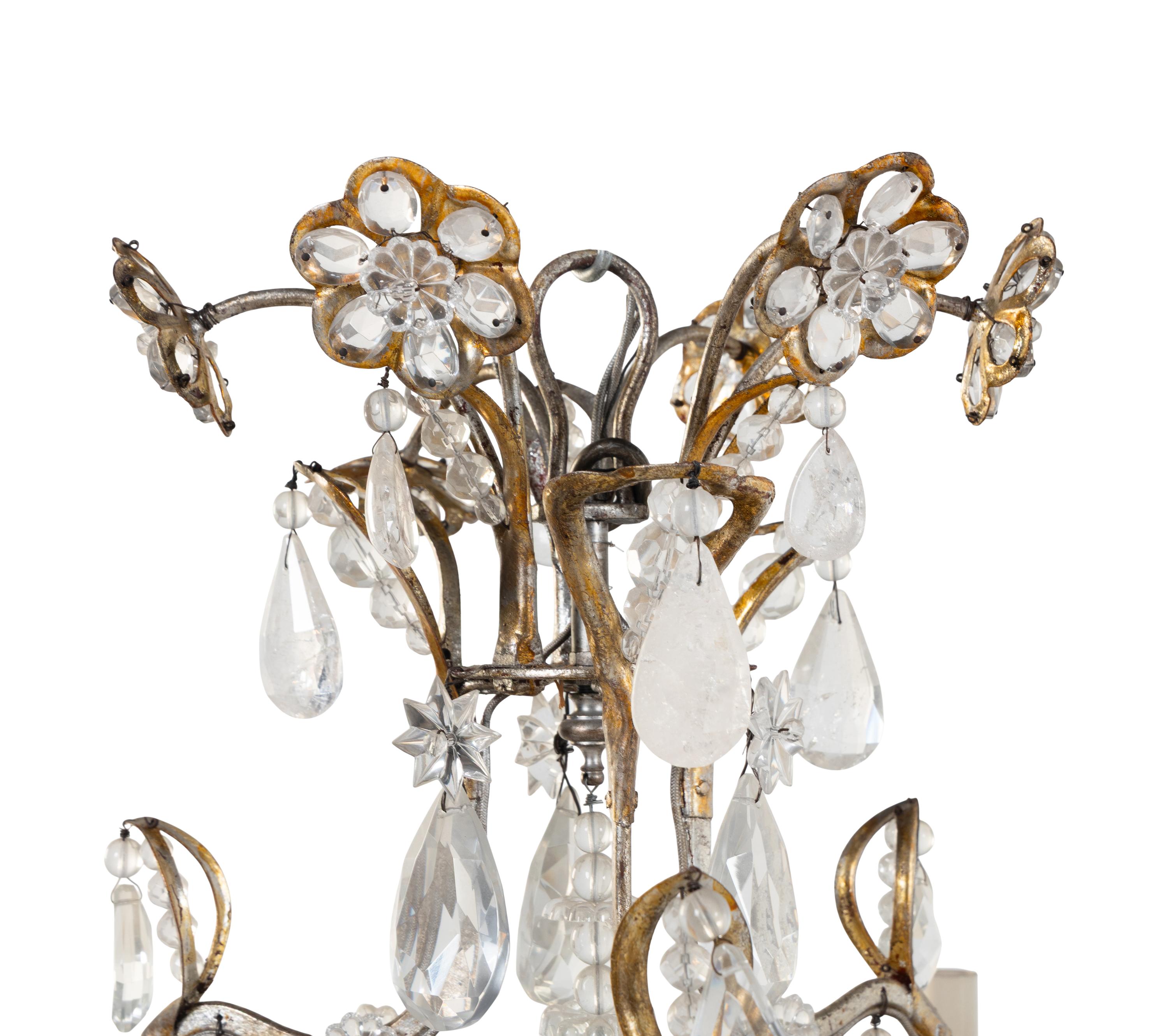 A Silvered and Gilt Metal, Cut Glass and Rock Crystal Twelve-Light Chandelier